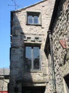 Unusual pediment for a window. Photo Phyllida Oates